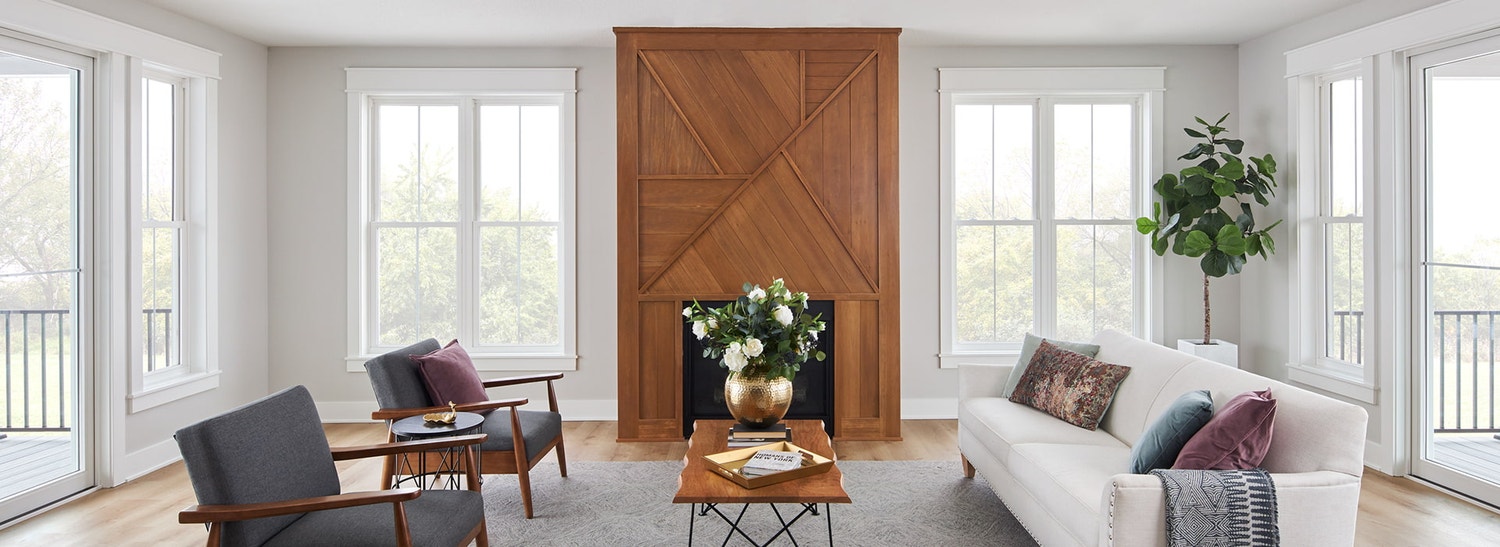 encompass by pella living room with double-hung windows and sliding door