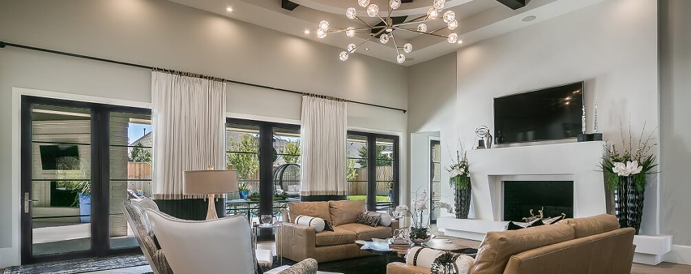 Row of three black french doors in modern style living room
