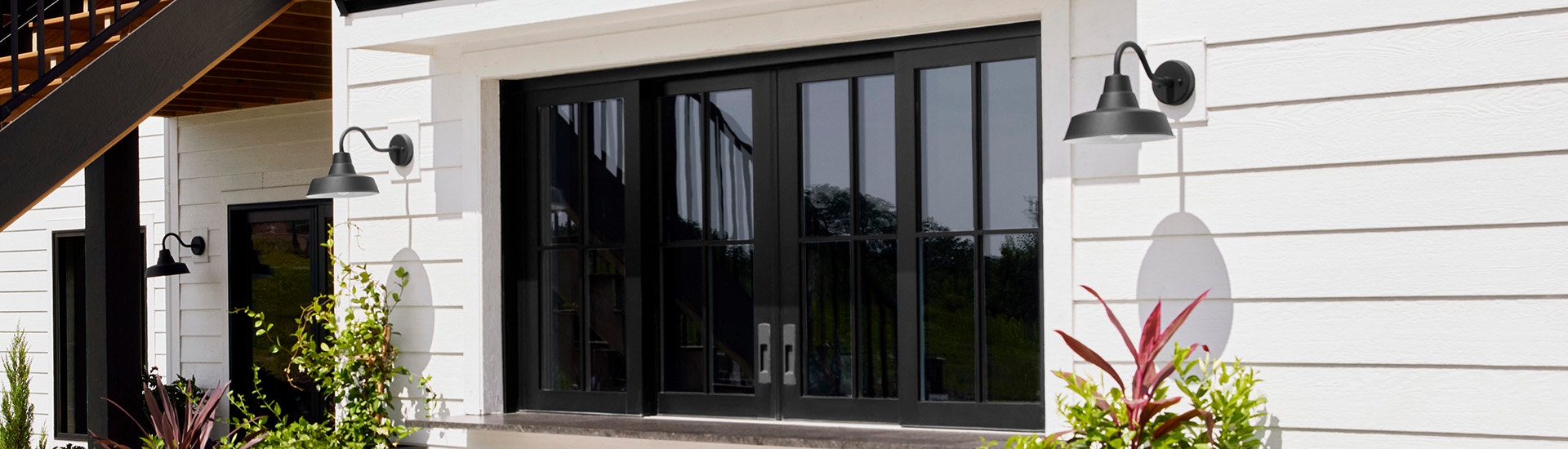 Pass-through windows on a white home exterior