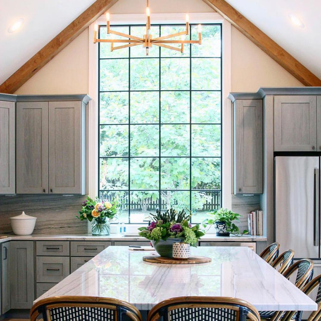 farmhouse style kitchen sink with large picture window