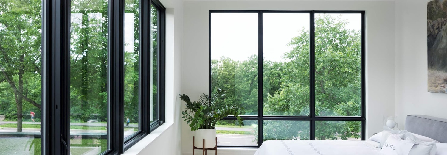 black trimmed fixed windows 3-wide